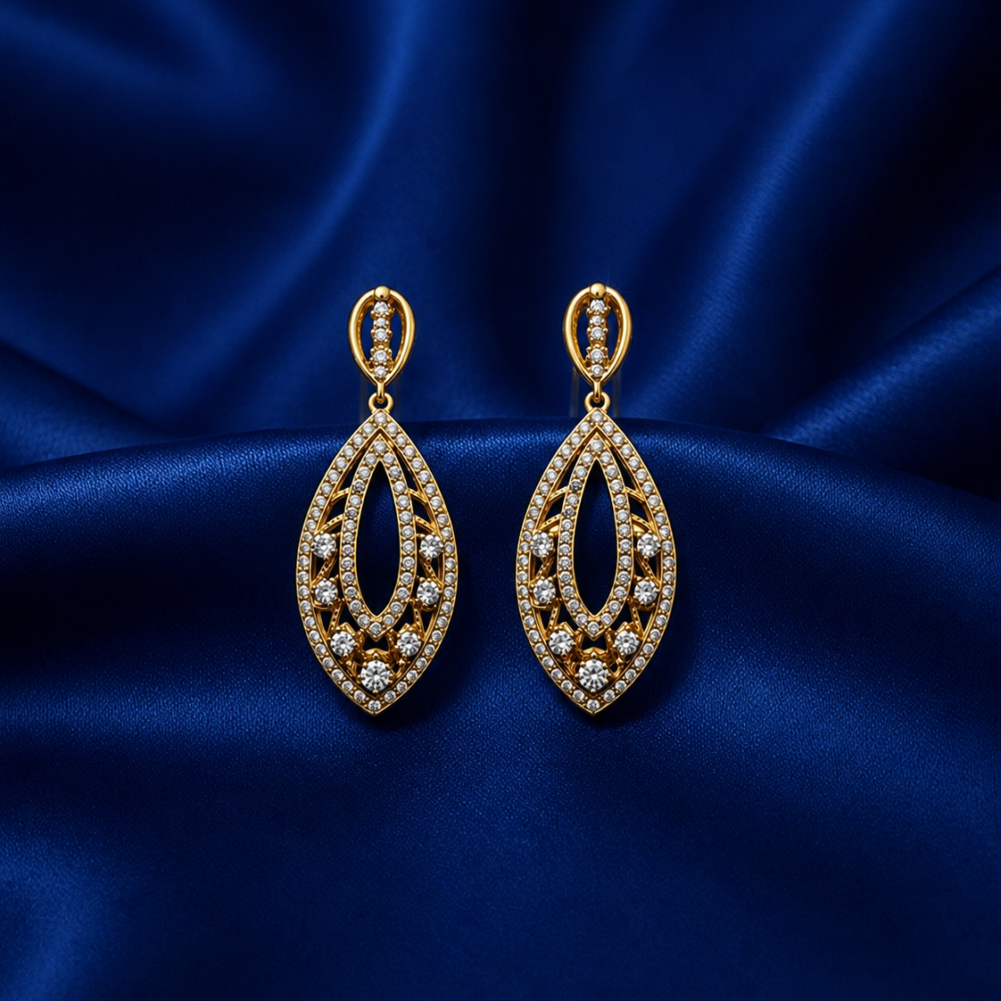 Elara Crystal Leaf Gold-Plated Drop Earrings