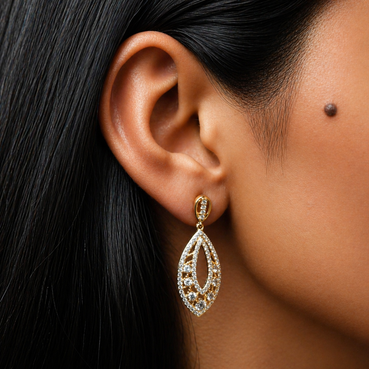 Elara Crystal Leaf Gold-Plated Drop Earrings